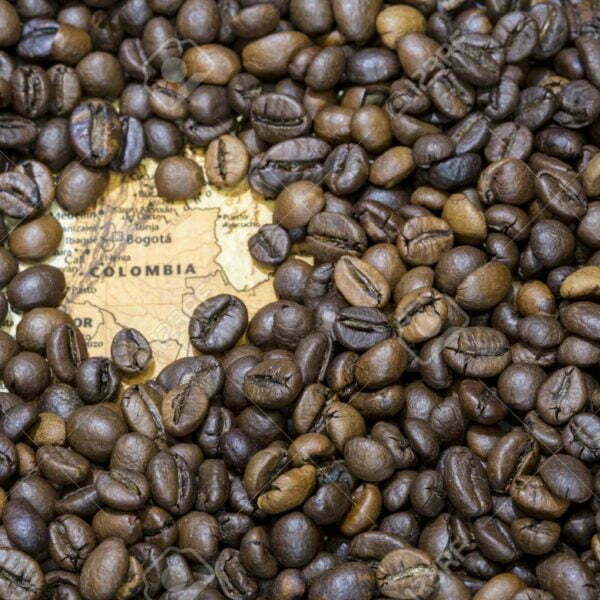 Map Of Colombia Under A Background Of Coffee Beans