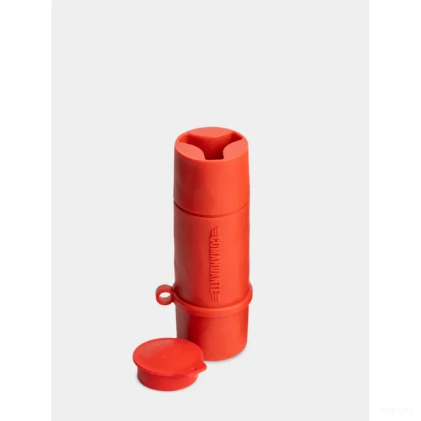 Comandante Clix Mate עם מכסה הסיליקון פתוח, נראית קפסולת האחסון הפנימית