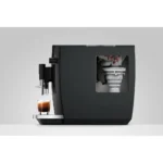 חתך של מכונת קפה Jura E6 דור 4 שמראה את מטחנת ה-Professional Aroma Grinder 2 ואת פולי הקפה